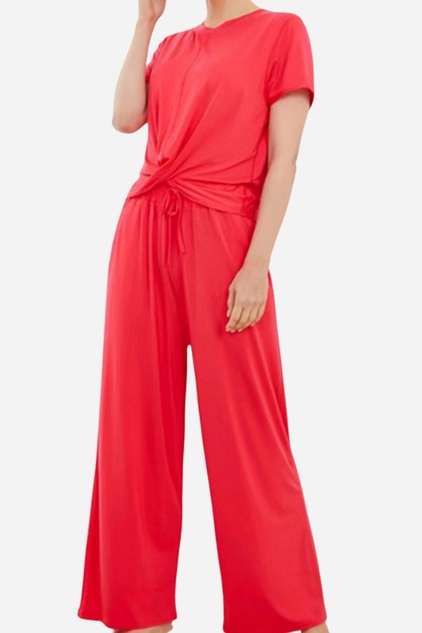 Red bamboo fiber pajama clothes with short sleeves and wide-leg pants in a breathable, eco-friendly fabric.