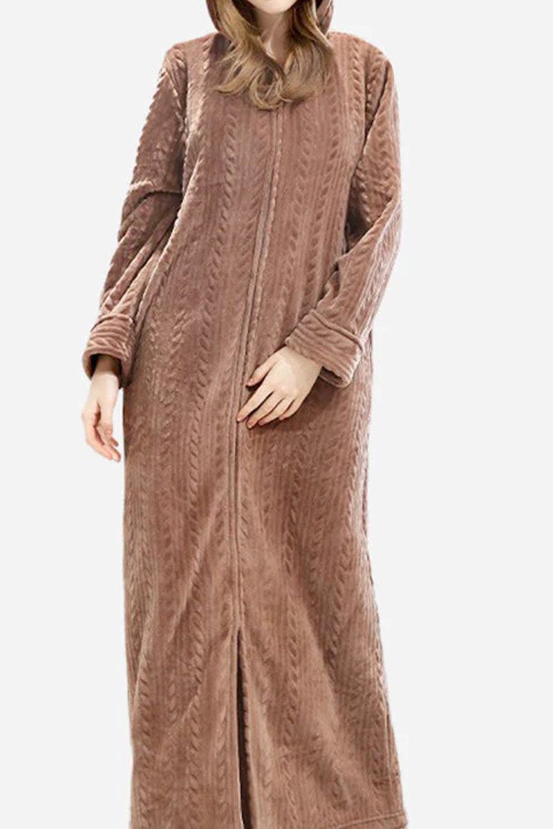 Woman wearing a soft, thick, brown stylish flannel nightgown with a front zipper and long sleeves