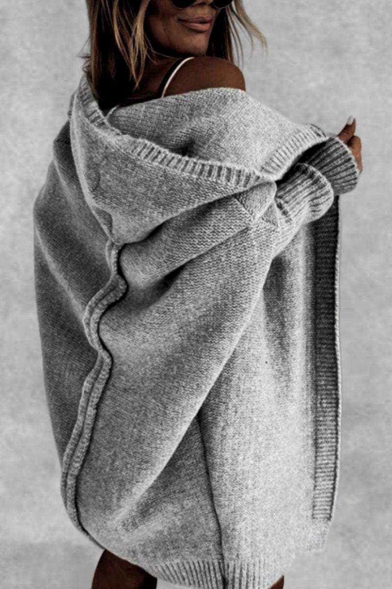Gray warm oversized hooded cardigan with relaxed fit and cozy knit fabric worn off-shoulder