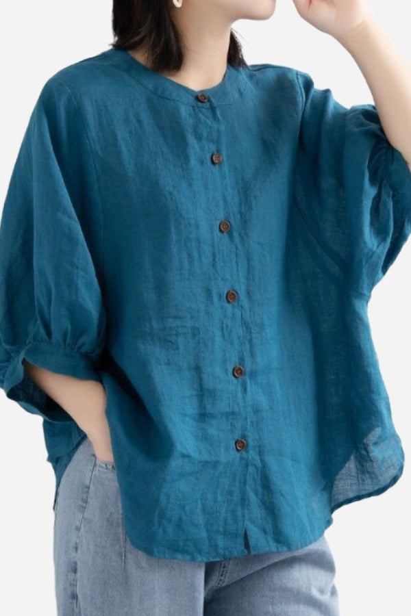 Relaxed loose breathable linen blouse in teal with button-down front and 3/4 sleeves
