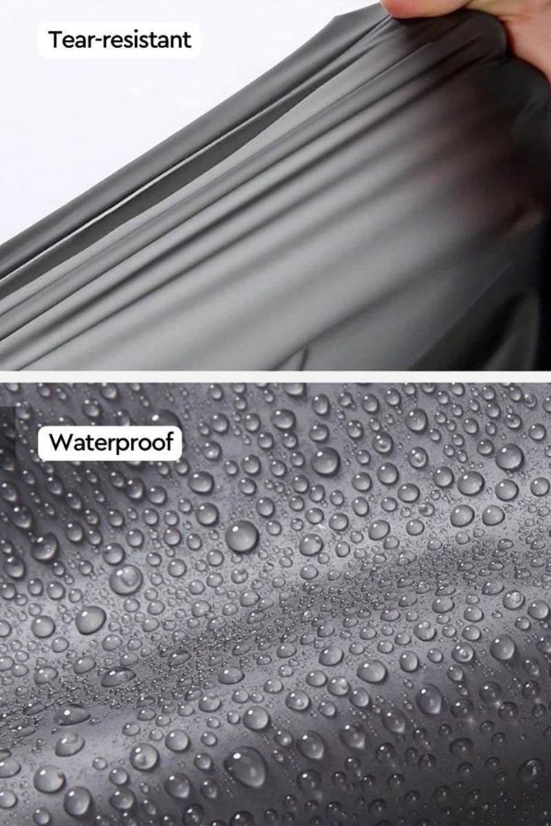 Close-up of Chic Drizzle Defender raincoat fabric showing tear-resistant and waterproof features with water droplets on black material