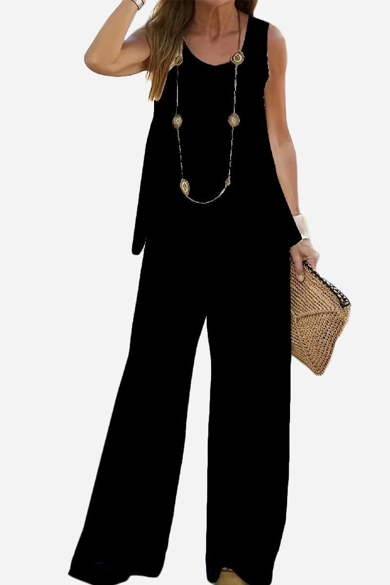 Black two-piece co-ord designed to balance apple-shaped body with sleeveless top and wide-leg pants.