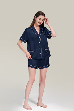 woman wearing navy blue Mulberry Silk buttoned short set pajamas