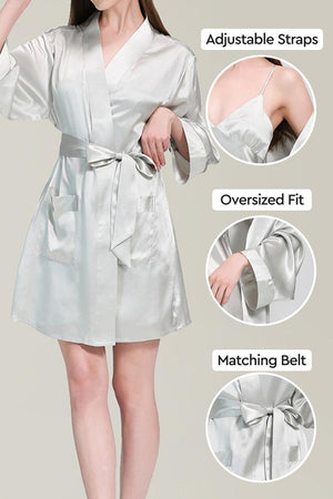 Woman wearing a white Mulberry silk nighty and robe set with adjustable straps, oversized fit, and matching belt