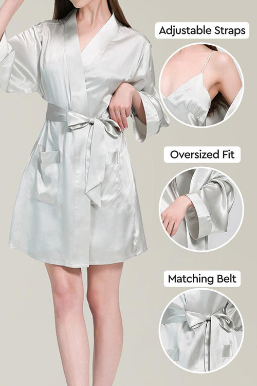 Woman wearing a white Mulberry silk nighty and robe set with adjustable straps, oversized fit, and matching belt