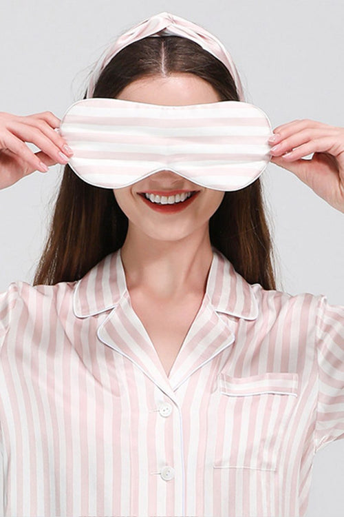 woman wearing 100% mulberry silk striped long sleeve pajama top with matching eye mask and headband