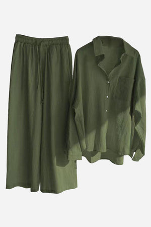 Olive green cotton-linen two-piece set with relaxed shirt and wide-leg pants.