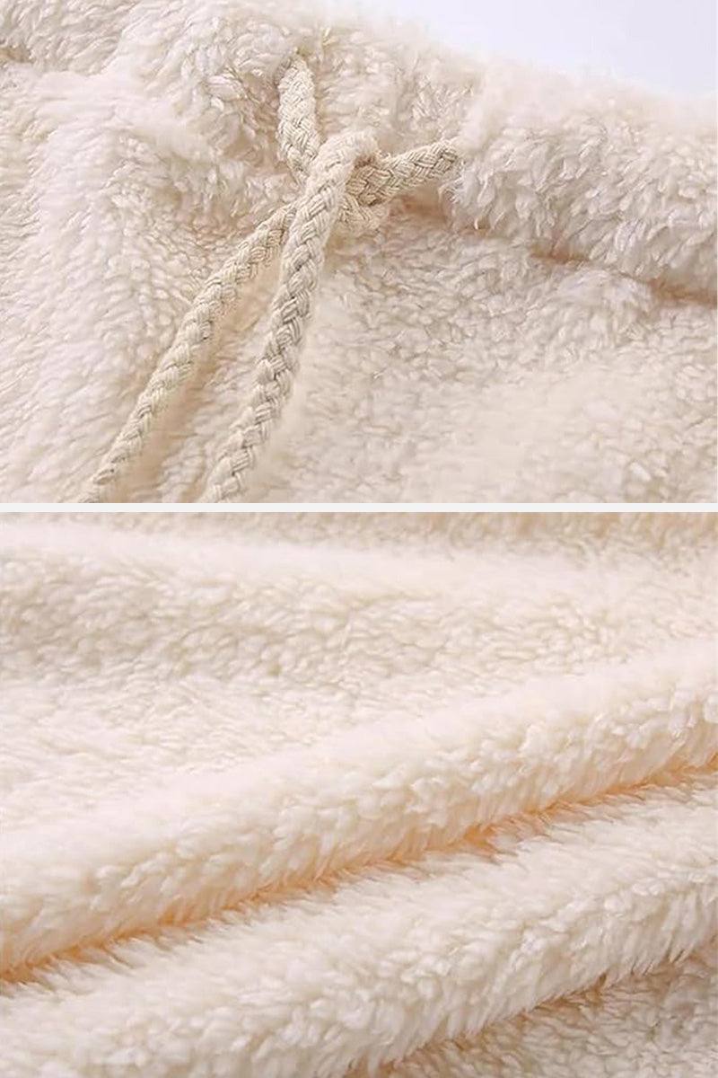 Close-up of soft cream sherpa fabric with braided drawstring from Cloud Soft 4-Piece Collection