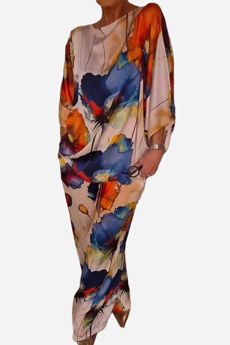 Plus size vibrant floral matching set with colorful abstract pattern and flowy silhouette