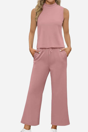 Cotton Chic Sleeveless two-piece set in soft pink with sleeveless top and wide-leg pants with pockets