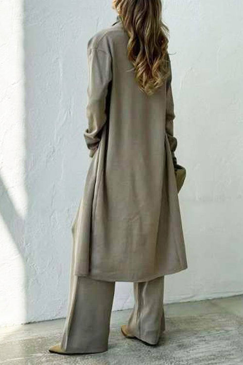 Woman wearing taupe one-size premium three-piece collection with cardigan and wide-leg pants seen from the back