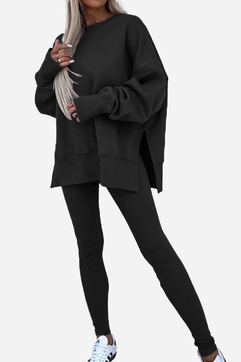 Woman wearing black TimelessChic Ultra Comfortable Two-Piece Set with oversized top and leggings