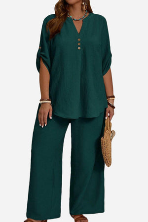 Wrinkle-free wide leg and top set in dark green polyester with button-front top and relaxed fit pants for comfortable travel wear