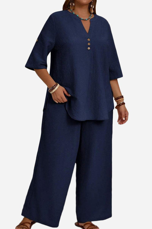 Navy wrinkle-free wide leg pants and button-front top set for comfortable elegant travel wear