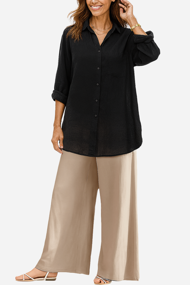 Woman wearing Oversized Linen Leaved-IN Set Lyss with black linen-blend shirt and beige wide-leg palazzo pants