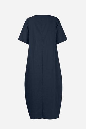 Navy Breeze Cocoon Dress with relaxed fit, rolled sleeves, deep pockets, and linen-like fabric.