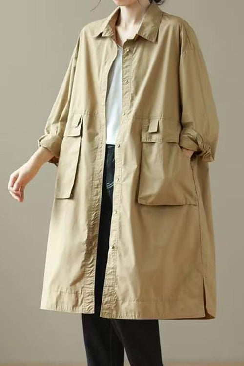 Nomad Ease Oversized Shirt-Jacket in beige with roll-up sleeves and large front pockets on model