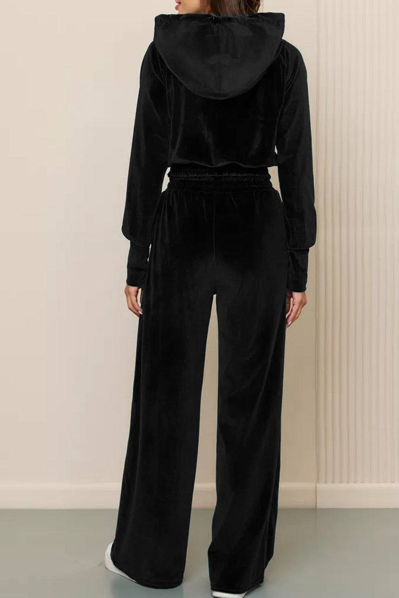 Black velour tracksuit with cropped hoodie and high-waist wide-leg pants, soft and plush texture