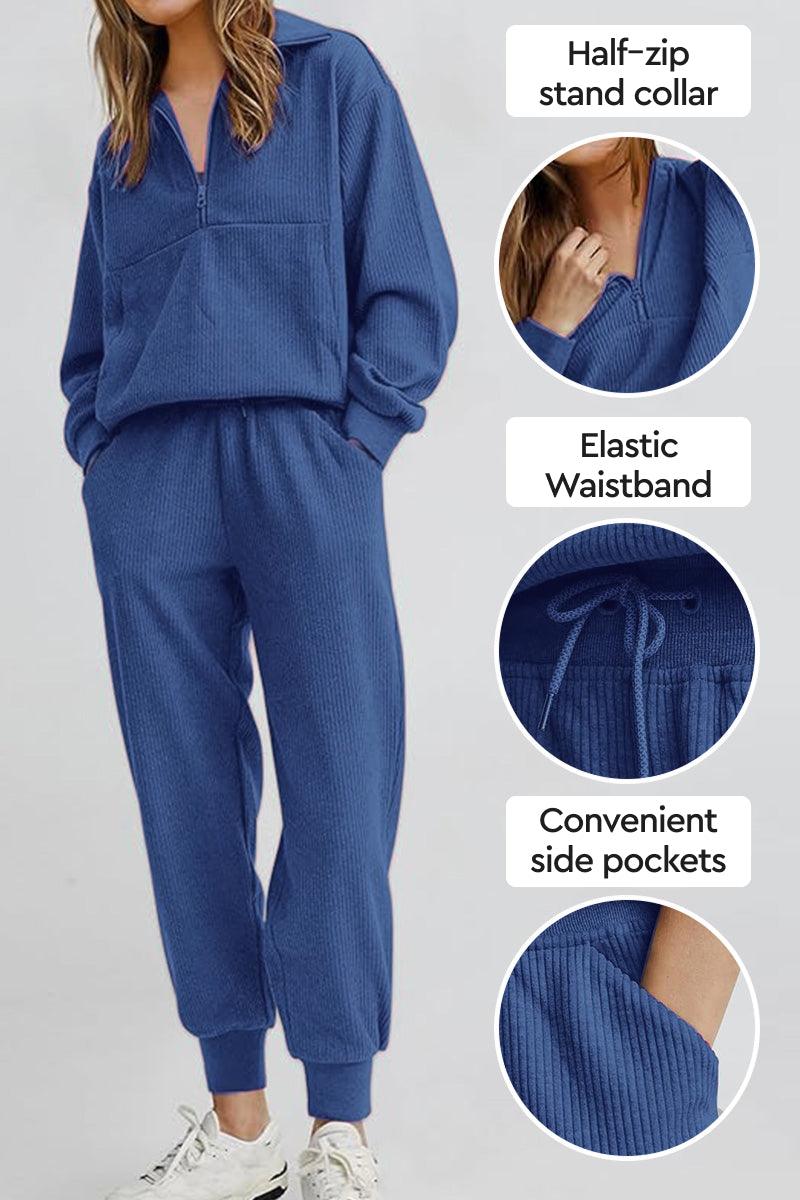 Unisex half-zip pullover and sweatpants set in blue with stand collar, elastic waistband, and side pockets