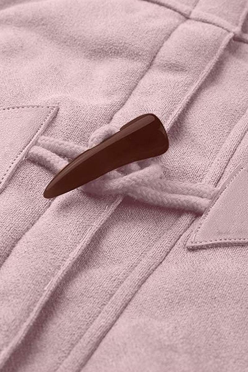 Close-up of warm toggle button on pink faux suede hooded coat with sherpa lining