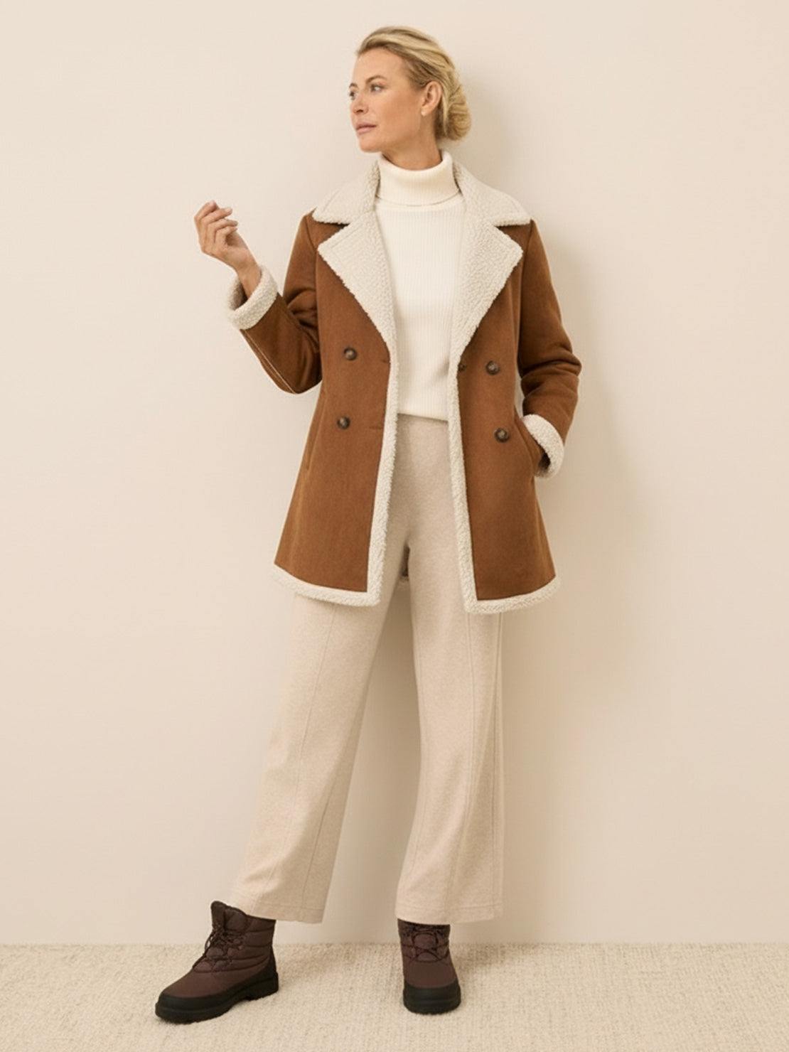 Mid-thigh faux suede sherpa coat with contrast collar and side pockets for lightweight warmth and relaxed fit