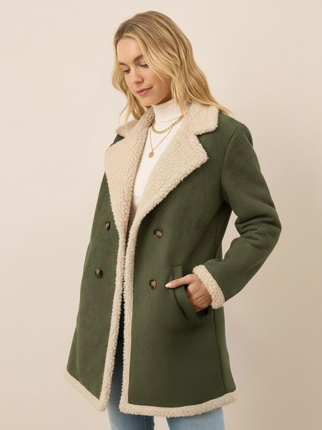 Women's faux suede sherpa coat with contrast trim, mid-thigh length, and side pockets for transitional weather.