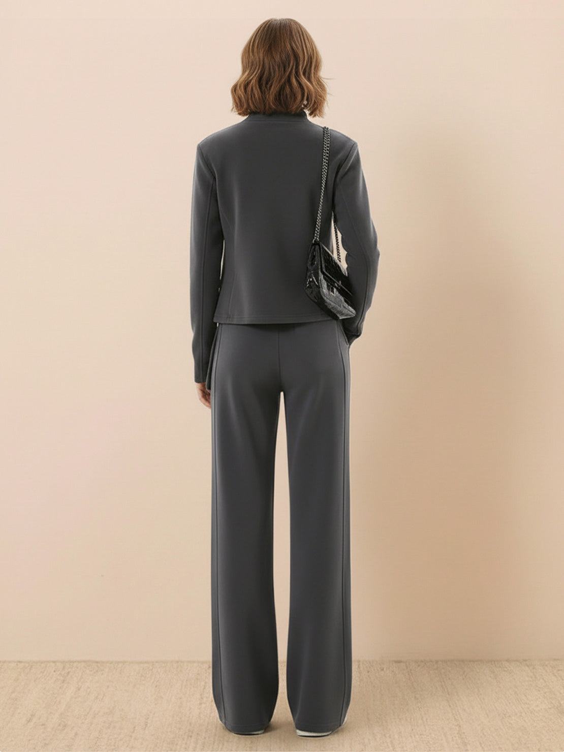 woman wearing soft warm nano-fleece zip two-piece set with wide-leg pants and hip-length jacket