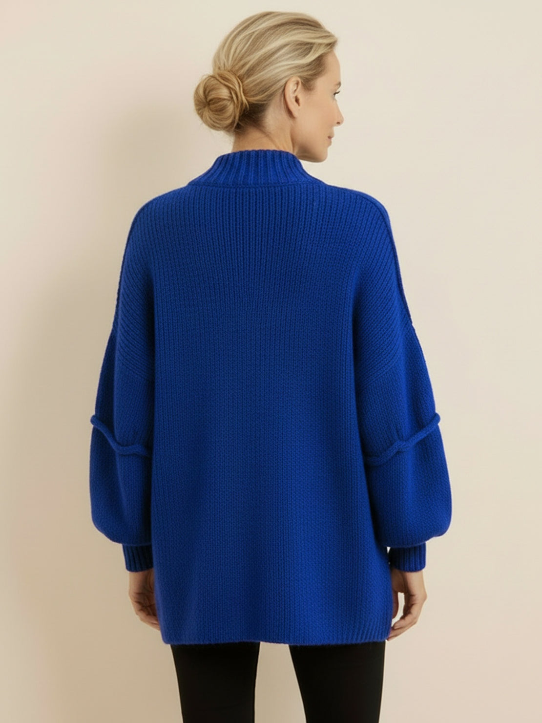 Oversized button-front knit cardigan with balloon sleeves and gold-tone buttons