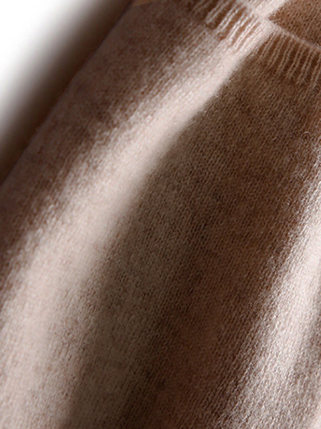 100% Australian Merino Wool long open-front cardigan with front pockets and ribbed cuffs