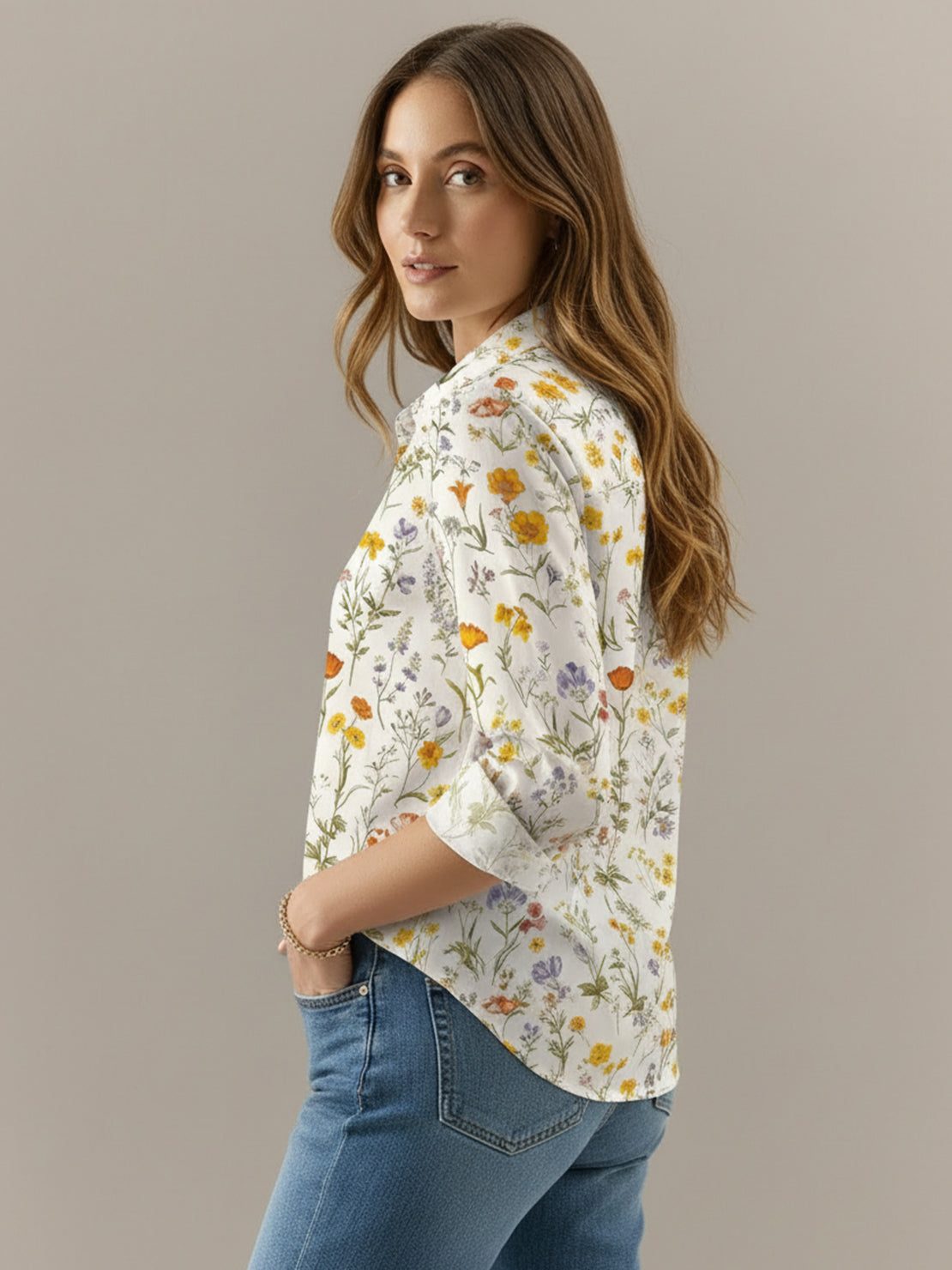 Women's floral button-down shirt with long roll-up sleeves and hip-length hem
