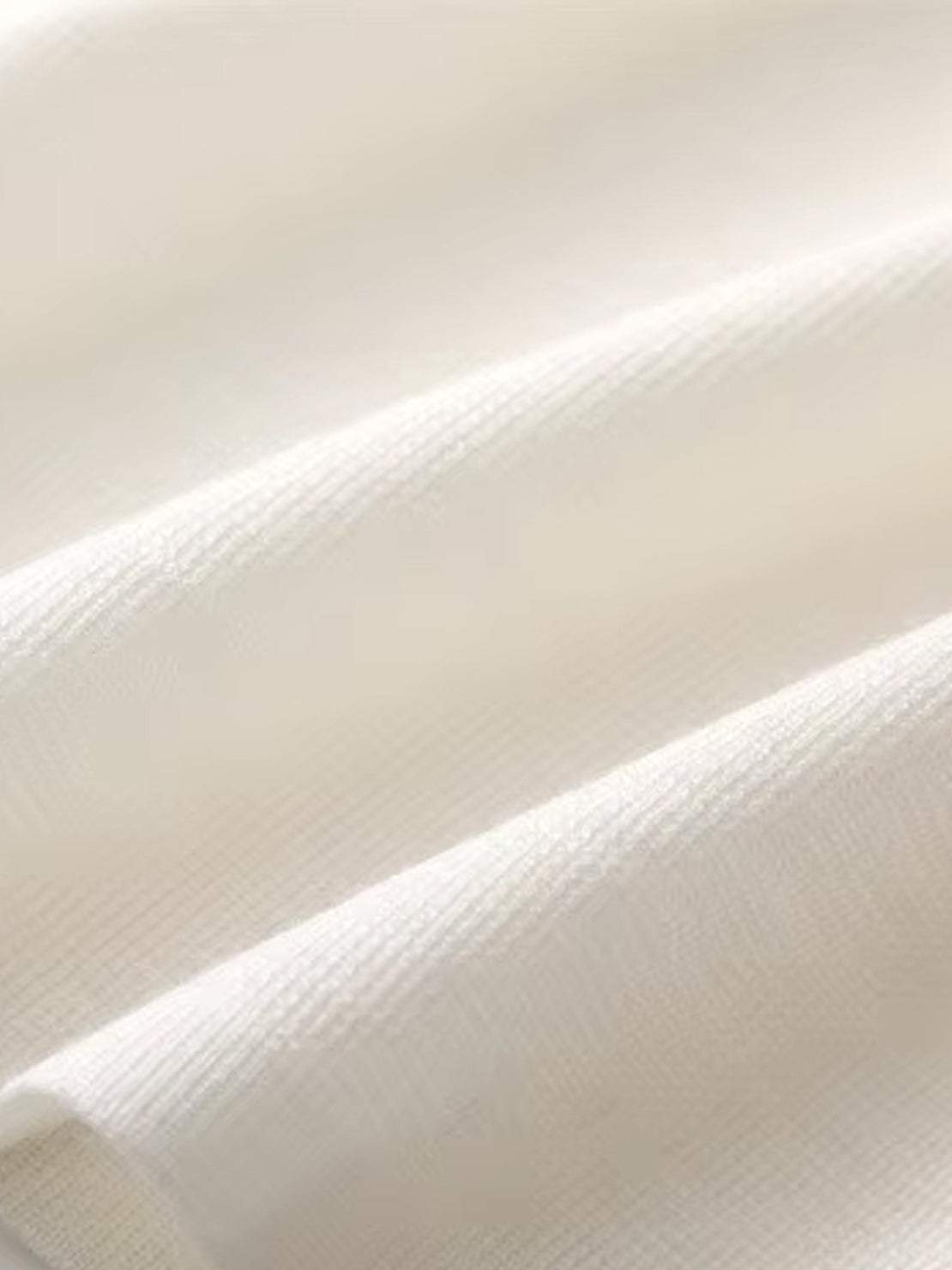 White 100% Merino Wool short-sleeve mock neck tee with slim fit and breathable fabric