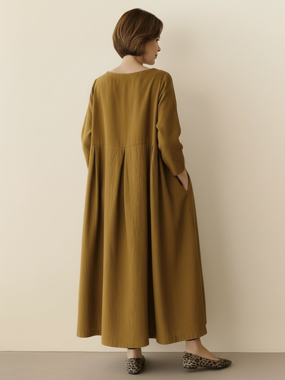 White cotton-linen empire waist maxi dress with 3/4 sleeves and pockets