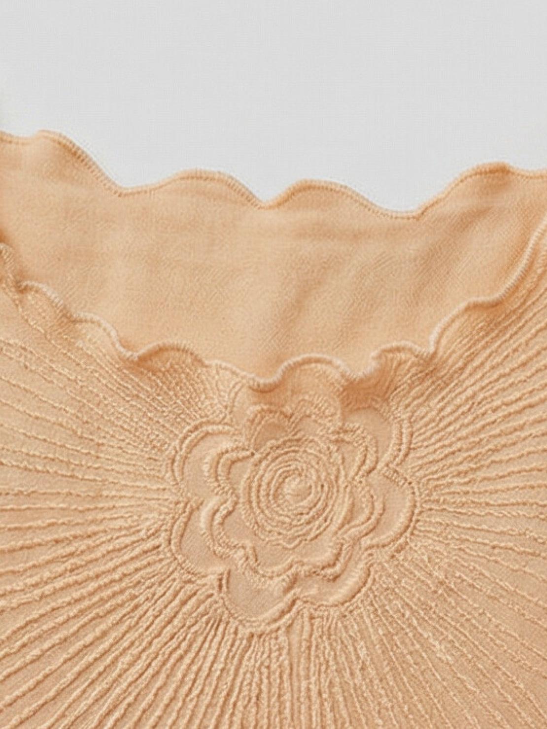 Floral jacquard pleated top with 3D floral texture, flutter sleeves, and relaxed A-line silhouette