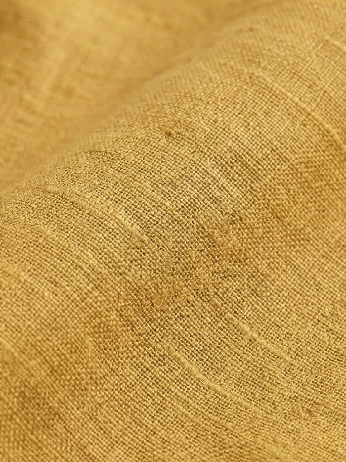 Lightweight sleeveless 100% cotton linen top with relaxed fit and chest pocket detailing