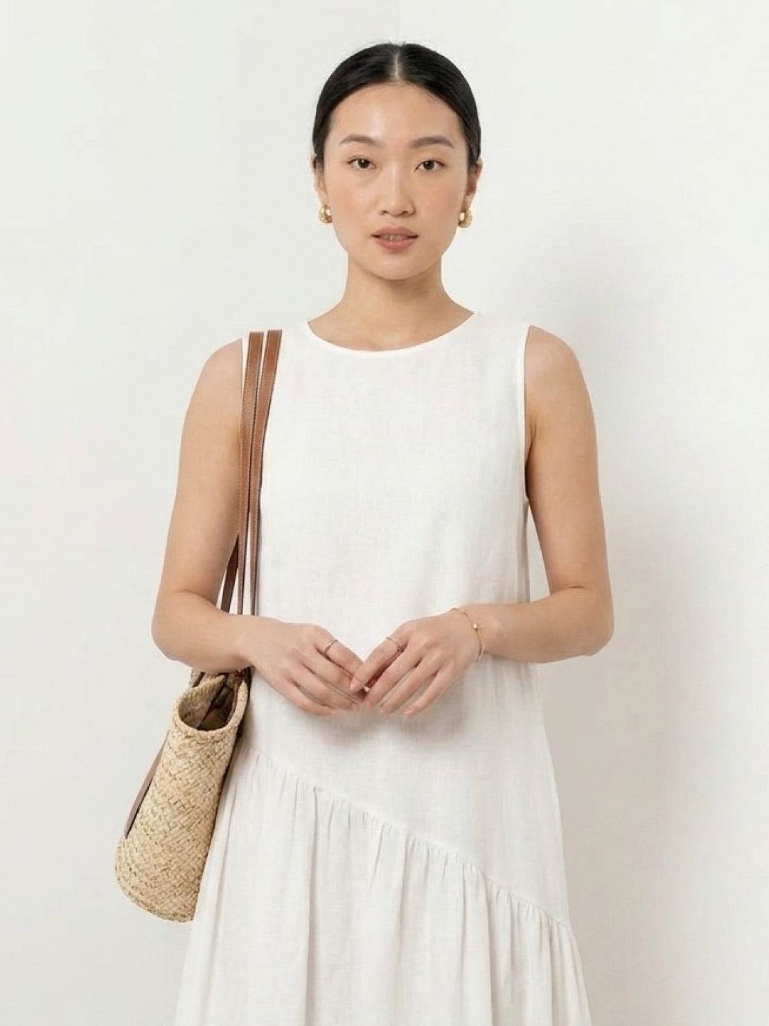 Lightweight cotton-linen summer midi dress with tiered skirt and round neckline in soft fabric