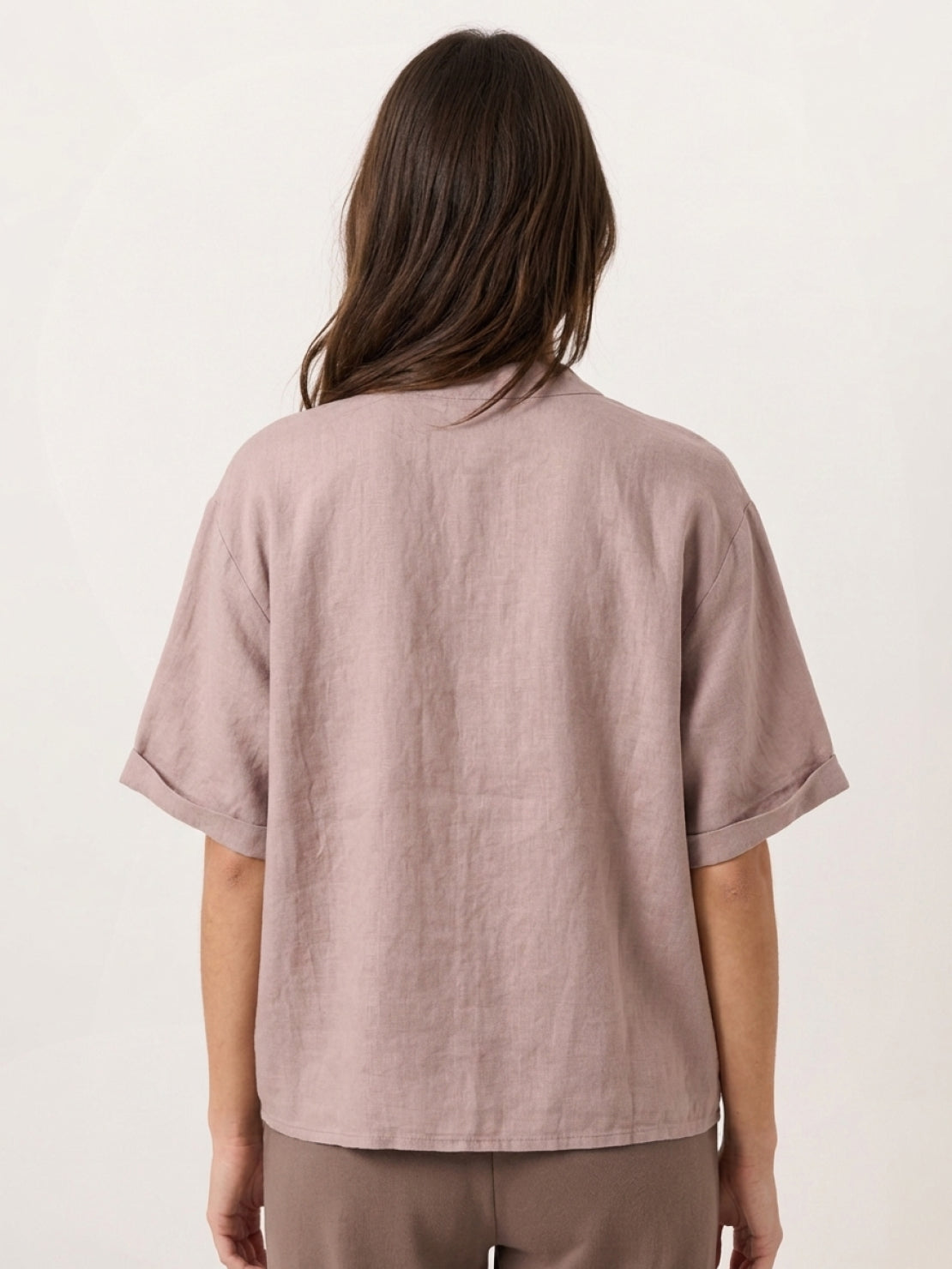 100% linen top with relaxed V-neck and asymmetric button detail in navy blue