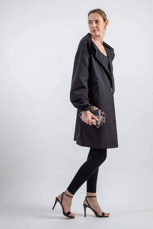 Water-Resistant Oversized Windbreaker rain jacket black long fit with hood worn by woman