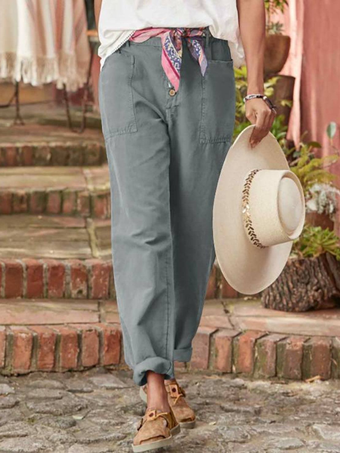 Casual button-down utility-chic trousers with deep pockets and tapered rolled cuffs in soft durable fabric