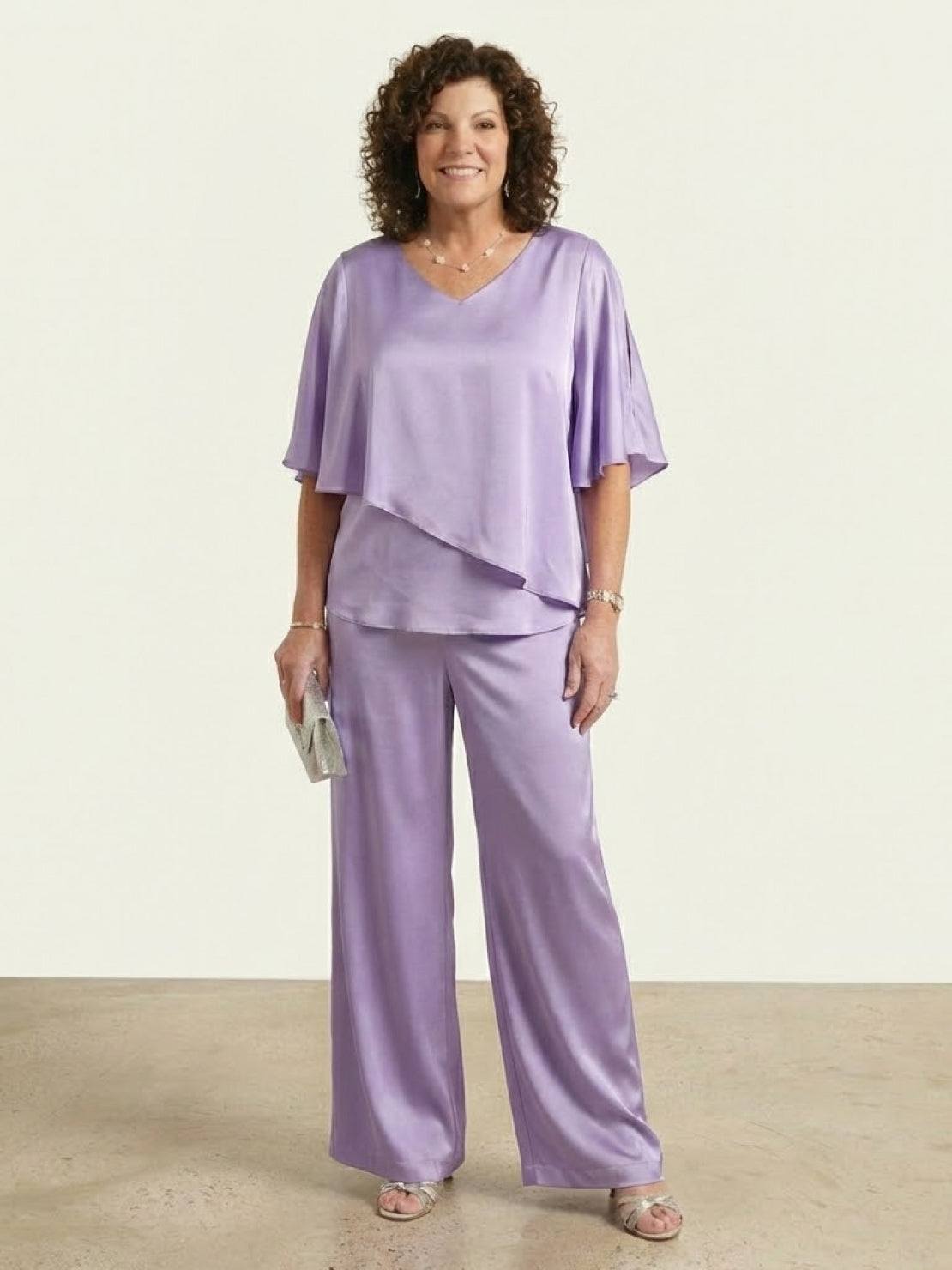 Woman wearing elegant layers two-piece set with flared sleeves and V-neck top