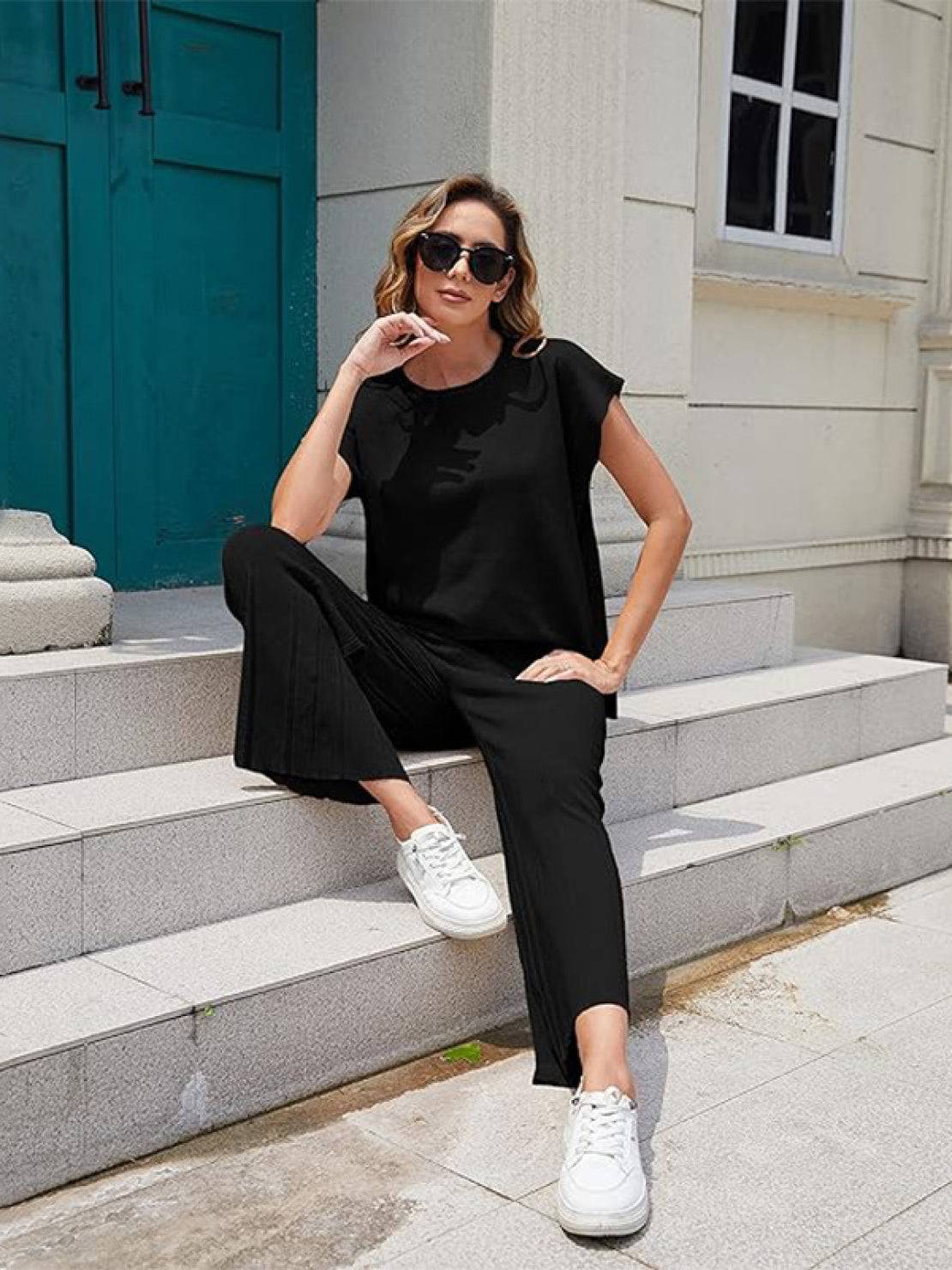 First Class Travel two-piece set in soft viscose-acrylic fabric with pleated design and wide-leg pants for wrinkle-resistant comfort and versatile elegance