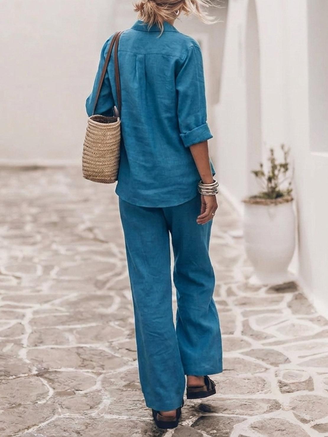 Woman wearing an oversized 100% cotton shirt and wide-leg pants co-ord set in a relaxed, breathable fit
