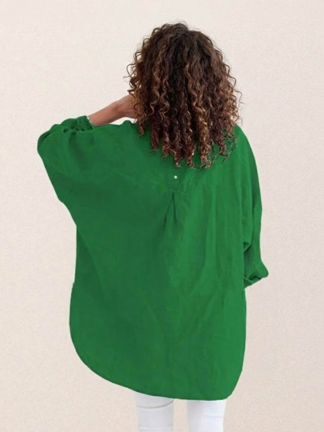 Oversized linen shirt in breathable cotton-linen blend with relaxed fit and back button detailing