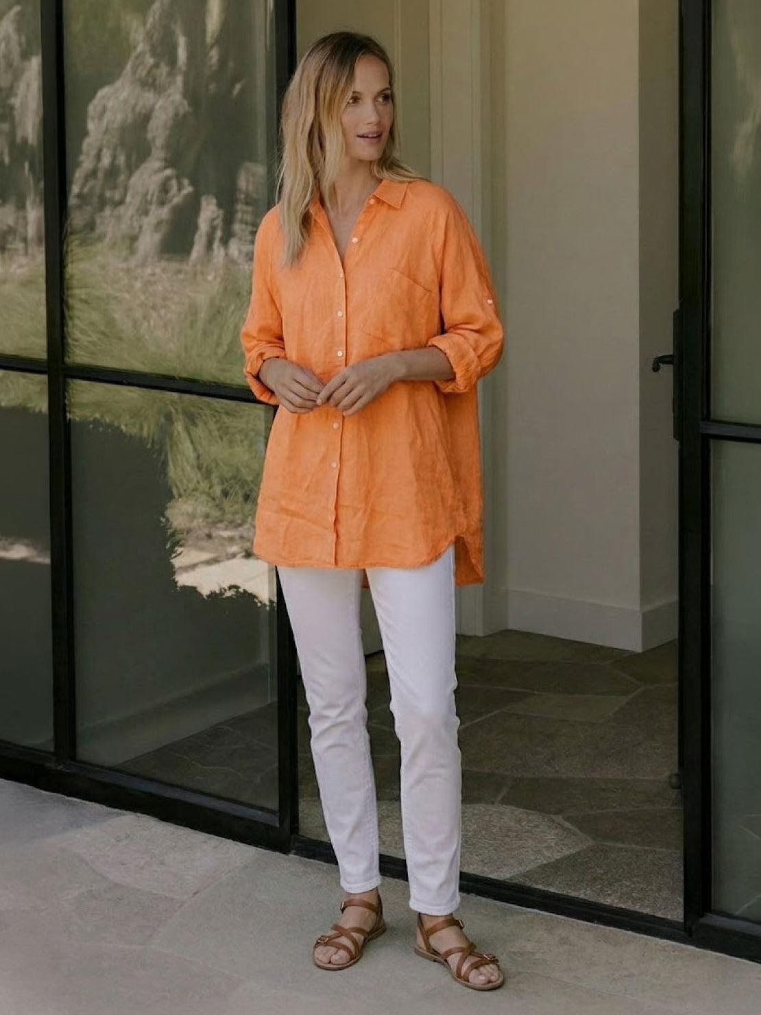 Oversized linen shirt made of breathable 45% linen and 55% cotton blend with relaxed fit and back button detailing