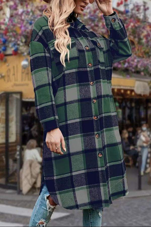 Oversized medium-length blue plaid overshirt with button front and long sleeves, styled for layering over casual outfits