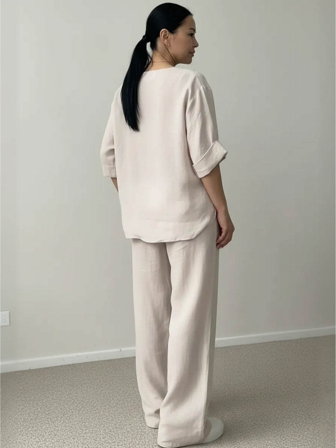 Pure linen two-piece casual comfort set in light breathable fabric with button-up top and matching pants