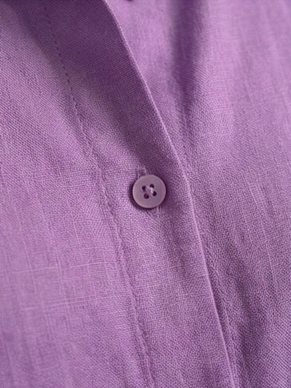 Woman wearing oversized 100% cotton shirt and wide-leg pants co-ord set