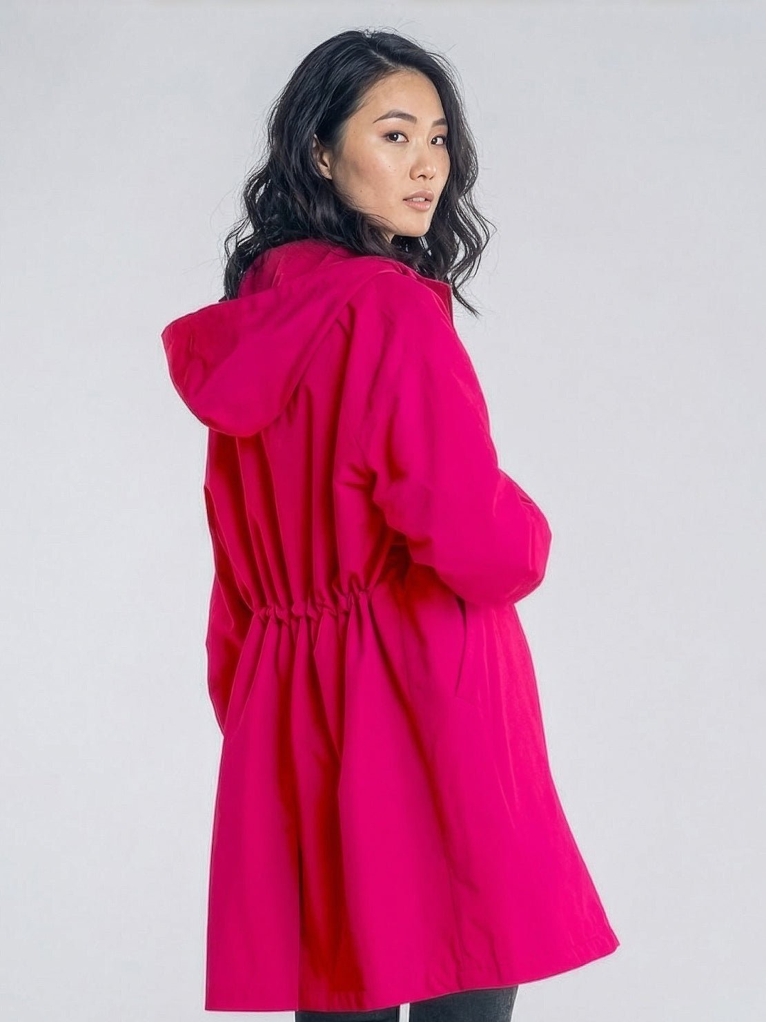 Water-Resistant Oversized Windbreaker rain jacket on hanger, lightweight and packable with multiple pockets and hood