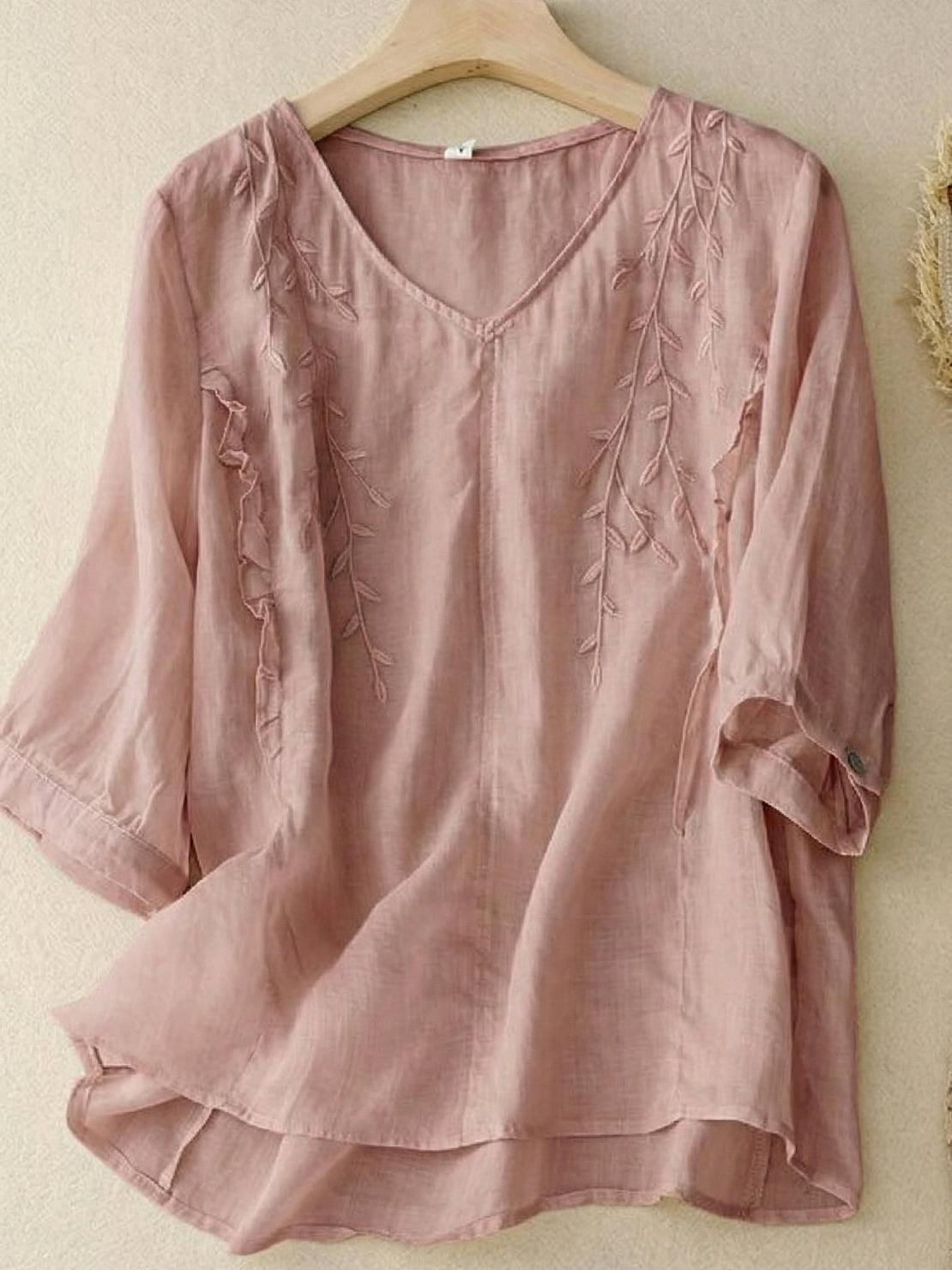 Elegant 100% cotton linen blend golden hour set with embroidered V-neck top and high-waisted wide-leg trousers.