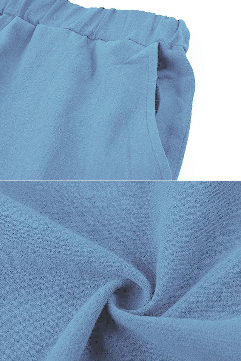 Close-up of blue 100% cotton linen fabric and pocket detail on elastic waistband pants