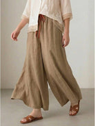 100% Cotton Linen Tuscany Rise 2 Piece Set with sheer embroidered top and wide-leg linen blend trousers on white background